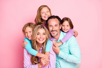 Family portrait concept. Photo of positive cheerful dad piggyback small younger daughter kids girl...