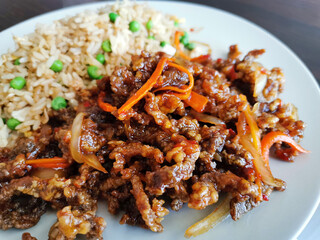 Crispy shredded beef with sweet chilli sauce. Chinese food.