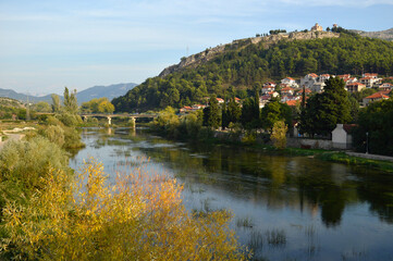 Fototapeta premium view of Trebinje town on the banks of river Trebisnjica, Bosnia and Herzegovina