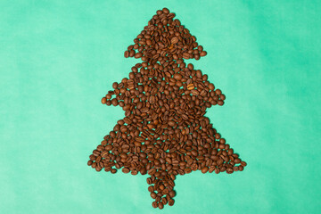 Christmas composition with food and drink. Christmas tree made from coffee beans. Flat lay, top view.