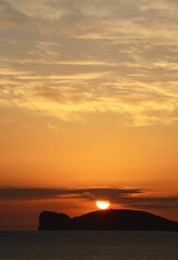 sunset over capo caccia, alghero, sardinia, italy