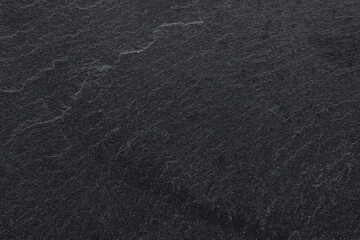Dark grey black slate background or texture.