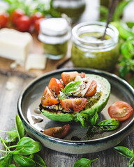 Avocado with tomato and vegetables