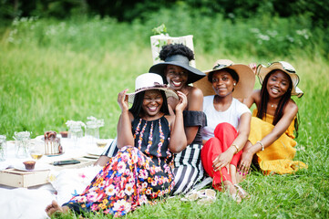 Fototapeta premium Group of african american girls celebrating birthday party outdoor with decor.