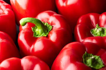Red bell peppers background. Top view