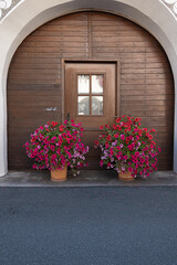 Fototapeta na wymiar The entrance of a traditional swiss house in Graubunden