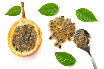 Granadilla or yellow passion fruit with green leaves isolated on white background. exotic fruit. top view
