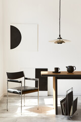 Stylish dining room interior with design wooden family table, black chairs, teapot with mug, mock...