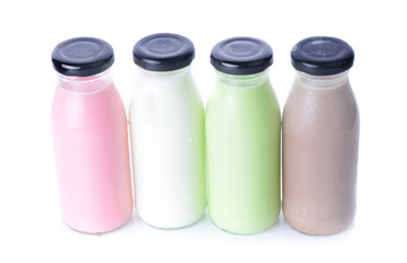 colored milk isolated on white background