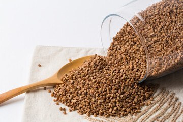 Raw buckwheat o white background