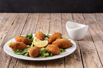 Traditional lebanese kibbeh on wooden table	.Copy space