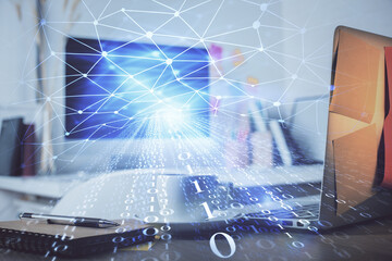 Multi exposure of desktop computer and technology theme hologram. Concept of software development.