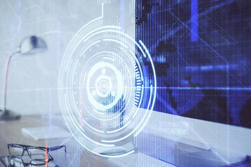 Double exposure of desktop computer and technology theme hologram. Concept of software development.