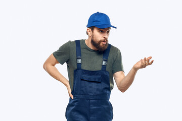 Worker man uniform delivery service emotions studio light background
