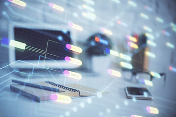 Double exposure of desktop computer and technology theme hologram. Concept of software development.