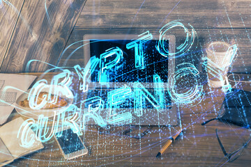 Double exposure of blockchain theme hologram and table with computer background. Concept of bitcoin crypto currency.