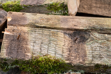 A pile of old boards suitable for the furnace, close-up, selective focus.