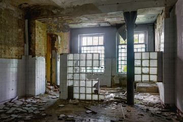 Fototapeta na wymiar Inside an old abandoned destroyed building