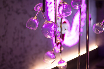 Hanging down wine glasses and krill heart lighting