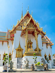 Dusit Maha Prasart Hall, one of the most important hall in the Grand Palace in Bangkok, Thailand, under blue sky