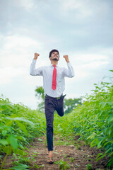 Indian man achieving success , Jumping in air