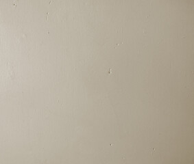 light beige painted plaster wall background with brush marks texture