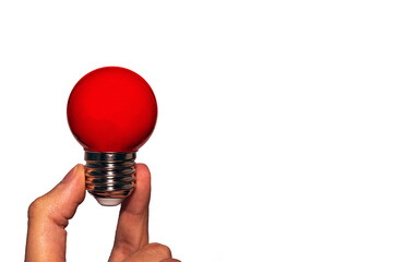 Great idea, the concept of a round Eletric red lamp in your hand. Isolate on a white background. Electric led red light bulb.
