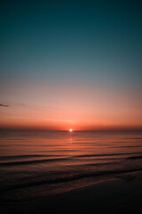 Naklejka premium sunset on the beach