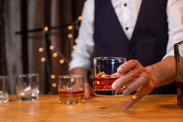 Bartender Serve Whiskey, on wood bar,