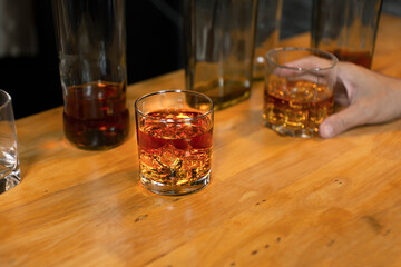 Bartender Serve Whiskey, on wood bar,
