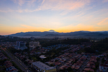 Fototapeta premium Aerial drone image of morning sunrise view in Kota Kinabalu City, Sabah, Malaysia