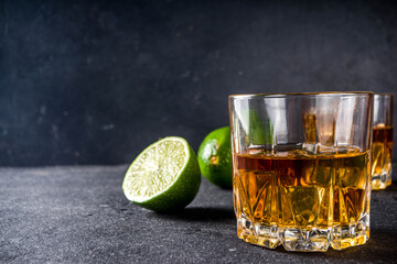 Whiskey with ice in glasses