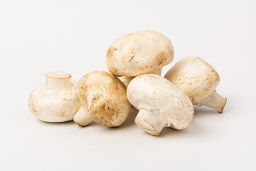 Fresh Champignon mushroom, isolated on white background. Close-up