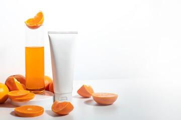 beauty treatment medical skincare and cosmetic lotion cream serum oil mockup bottle packaging product with orange fruit background in healthcare and medicine