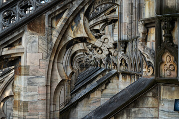 Detail of gothic architecture outside Milan Cathedral in Italy Europe Nativity of St Mary