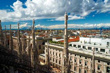 Fototapeta premium Panorama of Milan in Italy in summer from cathedral roof top