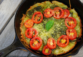 Cast iron pan cheese pizza with fresh tomatoes