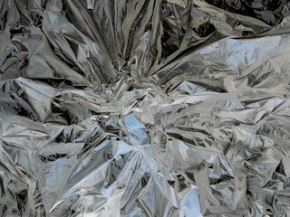 Abstract wrinkles on silver metal plates, silver wrinkled metal plates