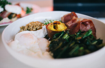 Delicious breakfast bowl with eggs and spinach
