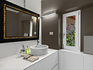 Fototapeta na wymiar modern bathroom interior with large mirror above the bathroom sink