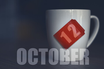 october 12th. Day 12 of month,Tea Cup with date on label from tea bag. autumn month, day of the year concept