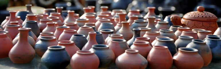 Fototapeta na wymiar Mini terracotta pots,Red clay flower pots,Collection of ceramic small flower pots