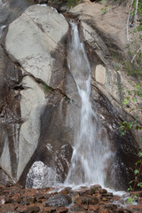 Fototapeta na wymiar Water cascading over rocks