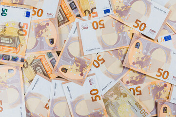 Fill the frame with many 50 Euro banknotes. Money, business, finical concept.
