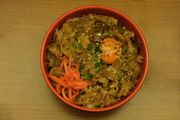 top view of Japanese beef and rice on wooden table. Traditional food in Japan