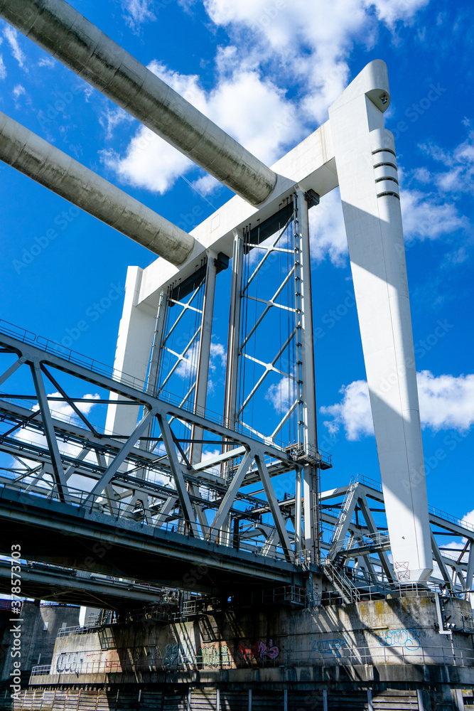 Poster vertical low angle shot of the foundation of a railway bridge