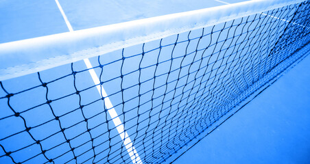 Tennis net on the tennis court. Selective focus