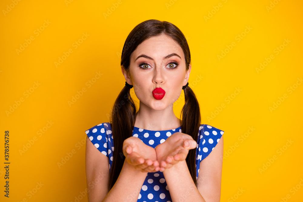 Poster Portrait of coquette lovely girl hold hand send air kiss wear good look clothes isolated over bright shine color background