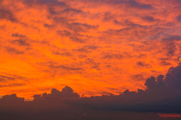 red and orange sun set on the open sky