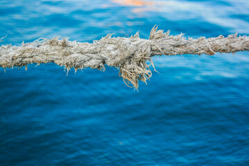 rope on the background of sea water © Iuliia Tregub